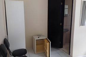 Suíte perto da praia com AC